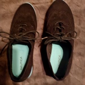 Nautica size 9.5 color black suede wing tip style shoes.